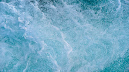 Turquoise color of river water. Blue sea, ocean for with wavesの写真素材