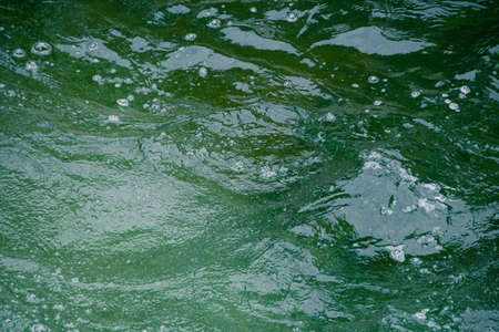 water surface of ocean, sea tide. Rapid flow of riverの写真素材