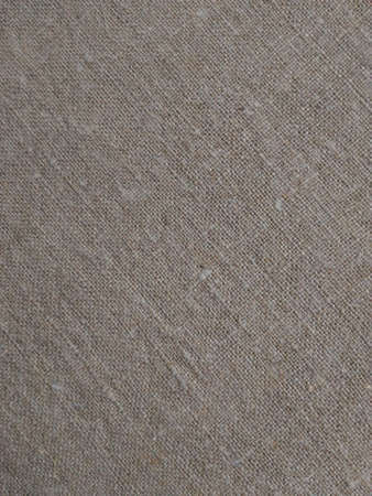 beige fabric canvas, burlap matter, linen textiles, texture backgroundの写真素材