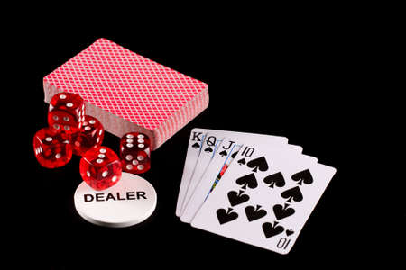 Playing cards and dice on black backgroundのeditorial素材