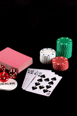 Playing cards and dice on black backgroundのeditorial素材