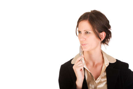 Attractive business woman wondering about something while looking upwardsの写真素材