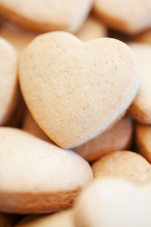 Many freshly baked shortbread heart shaped biscuits の写真素材