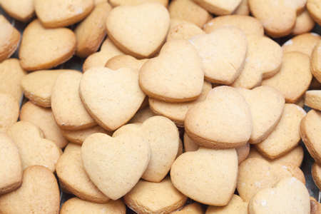 A heap of delicious heart shaped short bread cookiesの写真素材