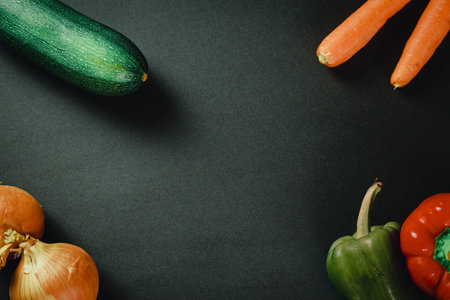 Bunch of vegetables over a dark table