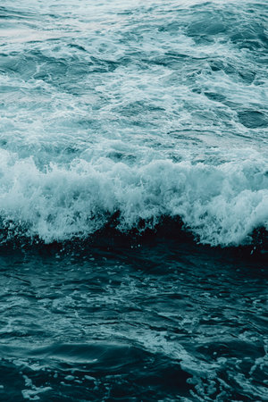 Deep blue single surf waveの写真素材