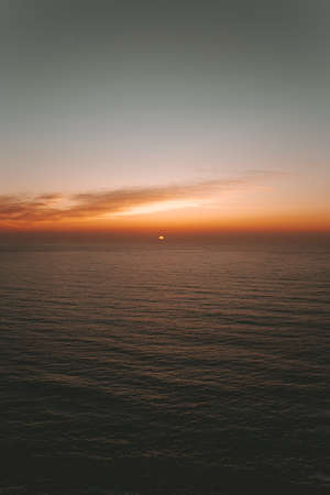 Minimalistic sunset over the seaの写真素材