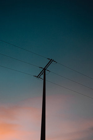 Moody electrical post during the blue hourの写真素材