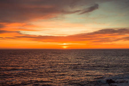 Spanish horizon during a colorful sunsetの写真素材