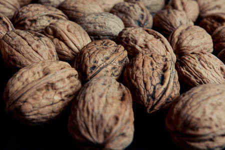 Close up of a lot of textured nutsの写真素材