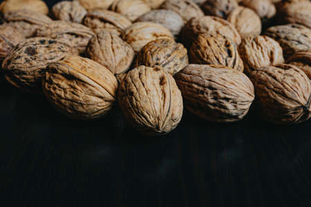 Close up of some nuts over a dark backgroundの写真素材