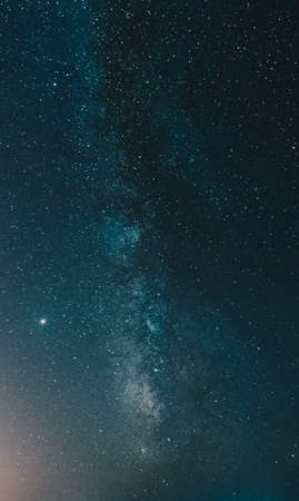 A close up of the milky way on deep blue tonesの写真素材