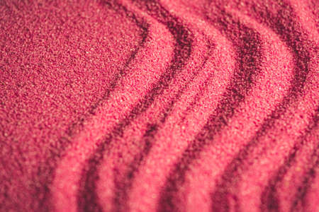 An horizontal background of pink sand with copy spaceの写真素材