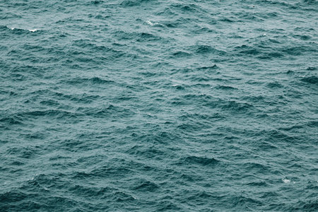 A flat background of the ocean with a lot of copy space