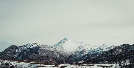 A panorama of the whole snowy mountain range in the peaks of europeの写真素材