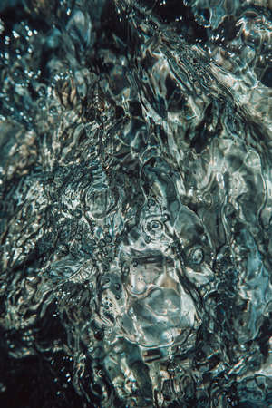 Some relaxing time stopped water background in white and blue tonesの写真素材