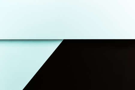 A white and black flat lay background with sharp layers and shadows with copy spaceの写真素材