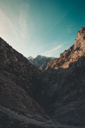 The tallest peak of the mountain range with another mountains around and a gloomy ambient in Asturiasの写真素材