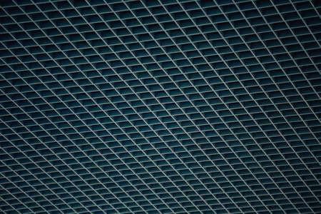 A metallic net background on gray and blue tones with black squaresの写真素材