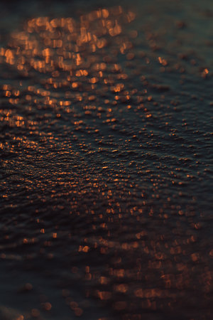 A super close up of the sand as the background with super texture on dark tones and minimalistic view, background, copy space, orange, black, blueの写真素材