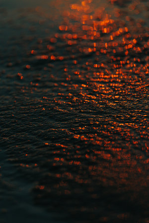 A super close up of the sand as the background with super texture on dark tones and minimalistic view, background, copy space, orange, black, blueの写真素材