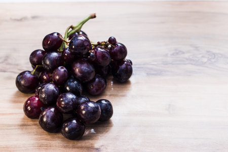 grapes on a wooden table