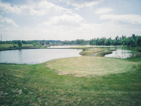 view of Golf Course with fairway field . Golf course with a rich green turf beautiful scenery.の写真素材