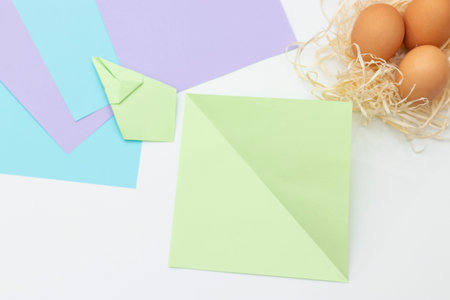 DIY Childrens Easter craft bunny with an egg. Step 13. Easter paper step by step instructions. Happy...