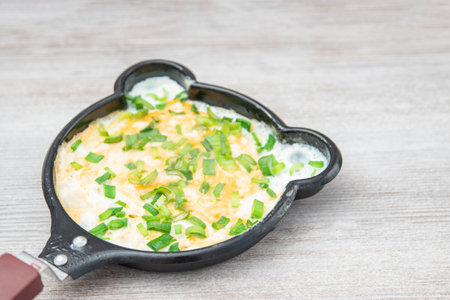 Fun food for kids. omelet for children in a frying pan. Healthy eating.の写真素材