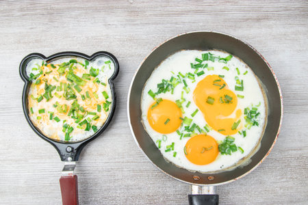 Fun food for kids. omelet for children in a frying pan. Healthy eating.の写真素材