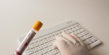 entering the data into the computer of the patient who tested positive for the covid 19