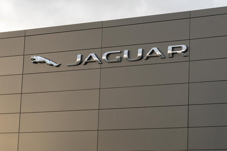 Burgos, SPAIN - December 06, 2020: Logo of the Jaguar Land Rover dealership which is a British multinational car manufacturer based in Coventry in Englandのeditorial素材
