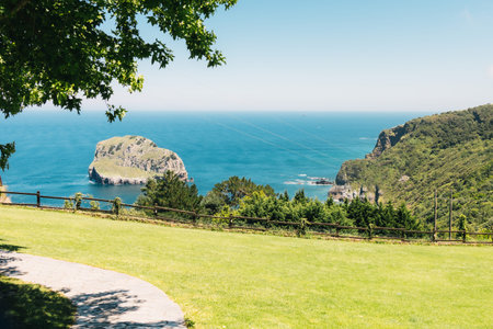 meadow of a viewpoint in bilbao where you can see the island of Aquech or Aqueche Island and the...
