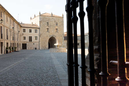part of the ancient walls of the Abbey of Santa MarÃ­a la Real de Las Huelgas with a fountain of a monastery in Burgos in Spainの写真素材