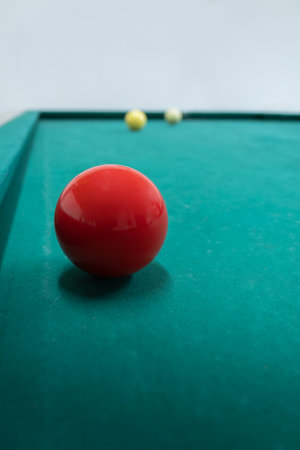 three cushion billiards with red ball highlightingの写真素材