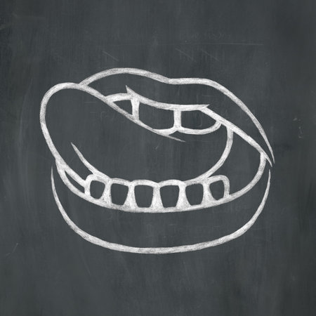 Hand-drawn illustration of a mouth licking its lips in white chalk on a blackboard background.の写真素材