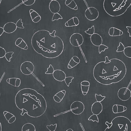 Hand-drawn pattern of various halloween treats in white chalk on a blackboard background. Seamlessly Repeatable.の写真素材