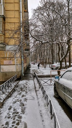 City quarter and footpath under snowのeditorial素材
