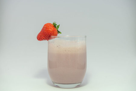 Strawberry smoothie in a glass cup. Highly recommended drink for our health. It is a very healthy drink.の写真素材