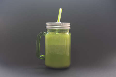Strawberry smoothie with a black background. Strawberry smoothie is a very healthy drink.の写真素材
