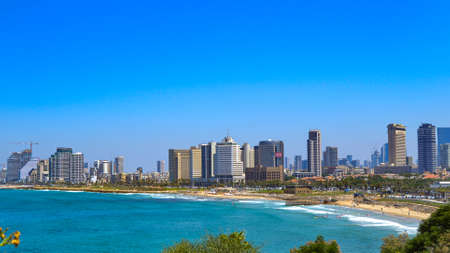 Tel Aviv is a city on the Mediterranean coast of Israel characterized by its austere Bauhaus buildings from the 1930s, thousands of which are located in the White City architectural area.の写真素材