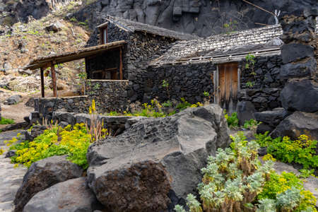 Houses in the Well of Las Calcosas. A must visit place on the Island of El Hierro. They are houses built with rocks.のeditorial素材