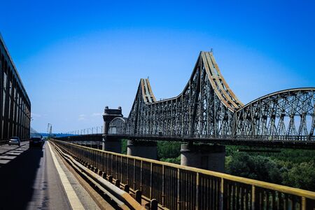 A railroad bridge and normal bridge beside each otherの写真素材