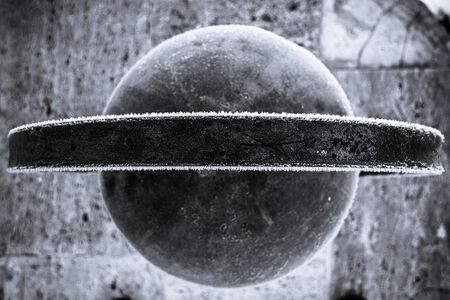 Photo of a street lamp taken from an interesting angle, looks like Saturn.の写真素材