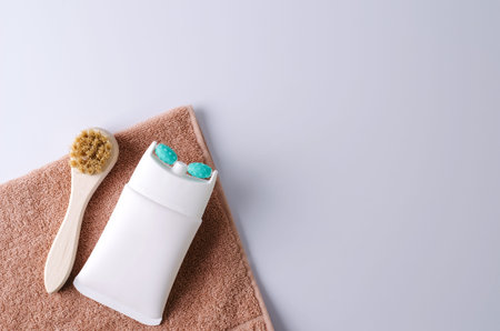 Cream massager, rejuvenating for the neck and decollete, lifting effect on a towel and brush to...