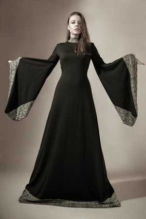 Young woman posing in medieval gothic dress Young woman posing in medieval gothic dress