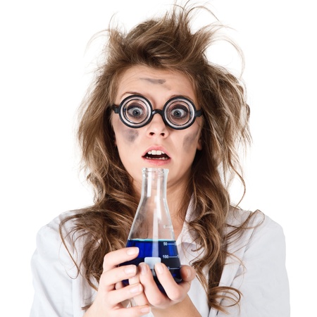 Crazy chemist woman with disheveled hair and vial in hands Crazy chemist woman with disheveled hair and vial in hands