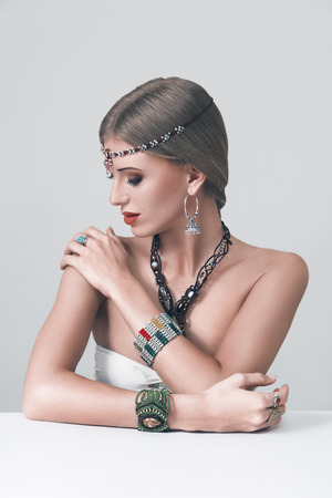 Young fashion woman posing with traditional indian jewelleryの写真素材