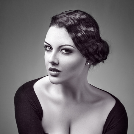 Young beautiful woman retro style fashion look portraitの写真素材