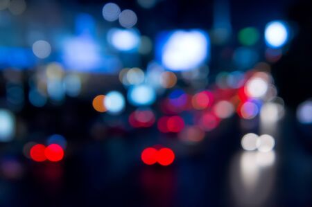 Abstract blurred background of night city street illuminationの写真素材